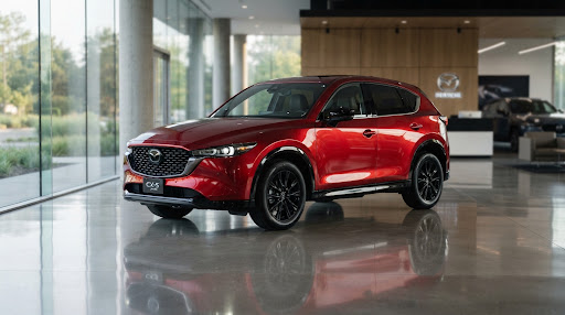 Red Mazda CX-5 SUV parked in showroom